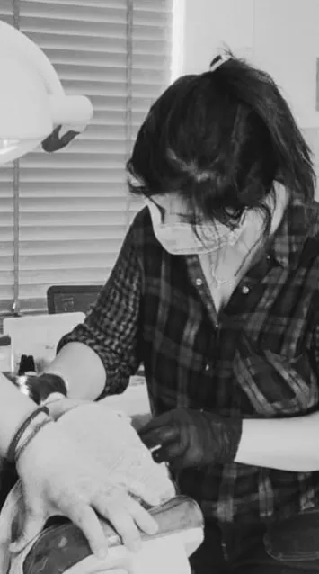 Dr. Arti Kumari concentrating during treatment